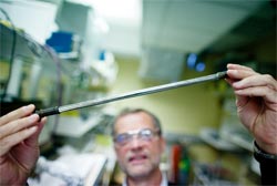 "We want clean water, clean air, food security, good use of resources and sustainable energy. That requires effective separation technology, and membranes are important," says Rune Bredesen, as he looks at his of palladium silver membrane which can separate hydrogen from CO2. Photo: Ståle Andersen