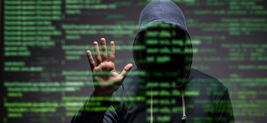 Cybersikkerhet: Bildet viser en hacker