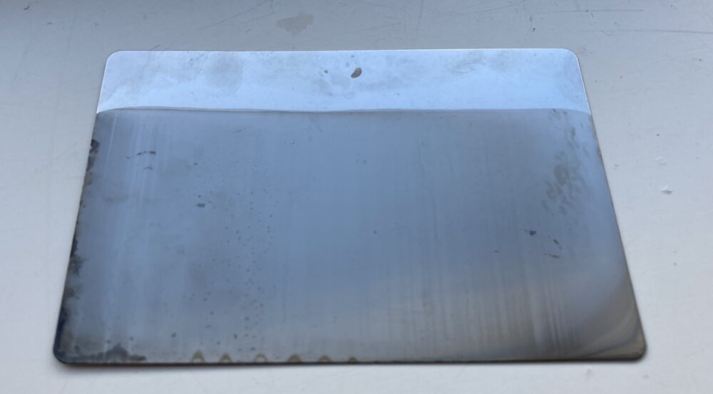 Hydrogen. Bildet viser en plate med nikkelbelegg.