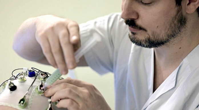 Migrene. Forsker og pasient.