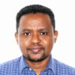 Portrett av bloggforfatter Yared Bekele, forsker i SINTEF Community.