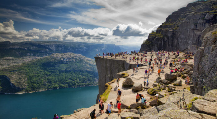 Preikestolen, Norway - July 28, 2014: Pulpit Rock (Preikestolen) is one of the most favourite attractions in Norway. Its a rock 600m above the Lysefjord. During the Summer there are a lot of people there - local people and tourists. Gosiek-B/iStock